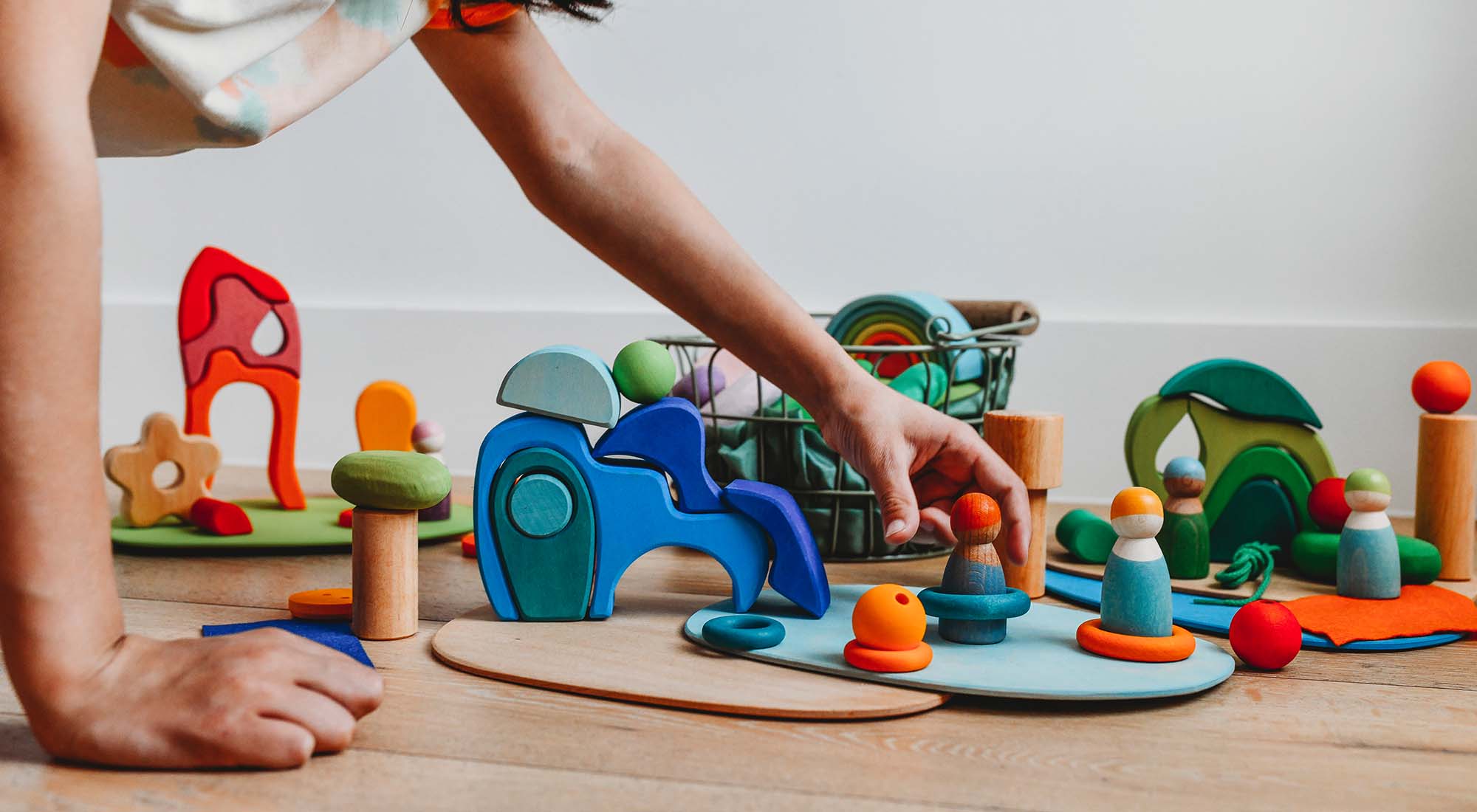 wooden toys on the floor