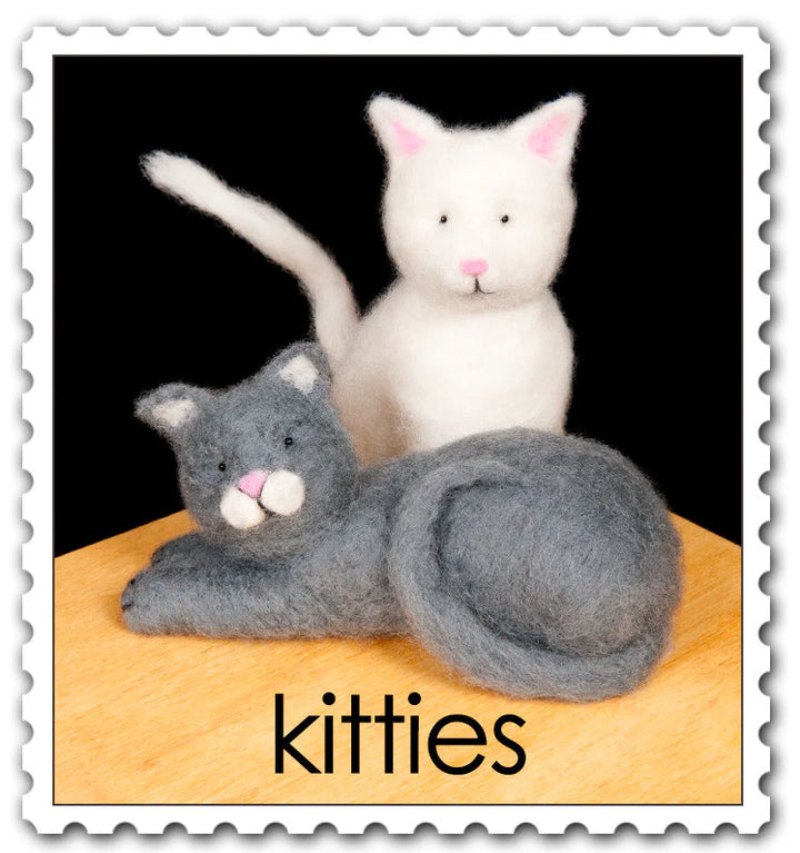 Two needled felted cats from the Kitties needle felting kit by Woolpets.