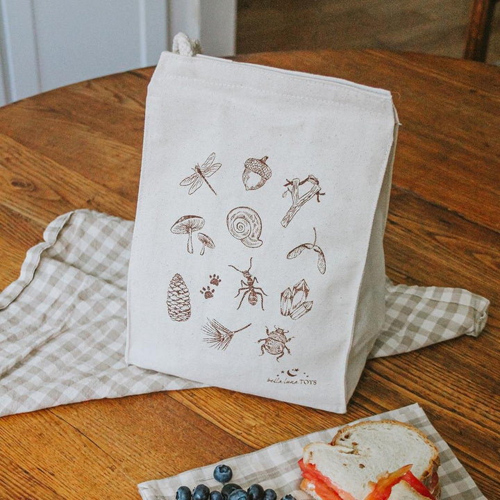 Bella Luna Custom Eco Lunch Bag on a wooden table.