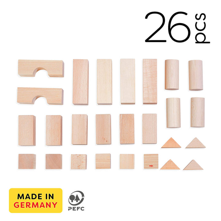 Basic Building Blocks 26 Piece Starter Set includes 26 wooden building blocks in various geometric shapes. Made in Germany with PEFC certification