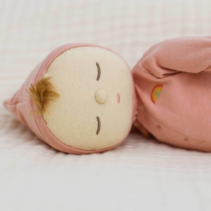 Close up of Dozy Dinkum Doll Moppet's face with embroidered features