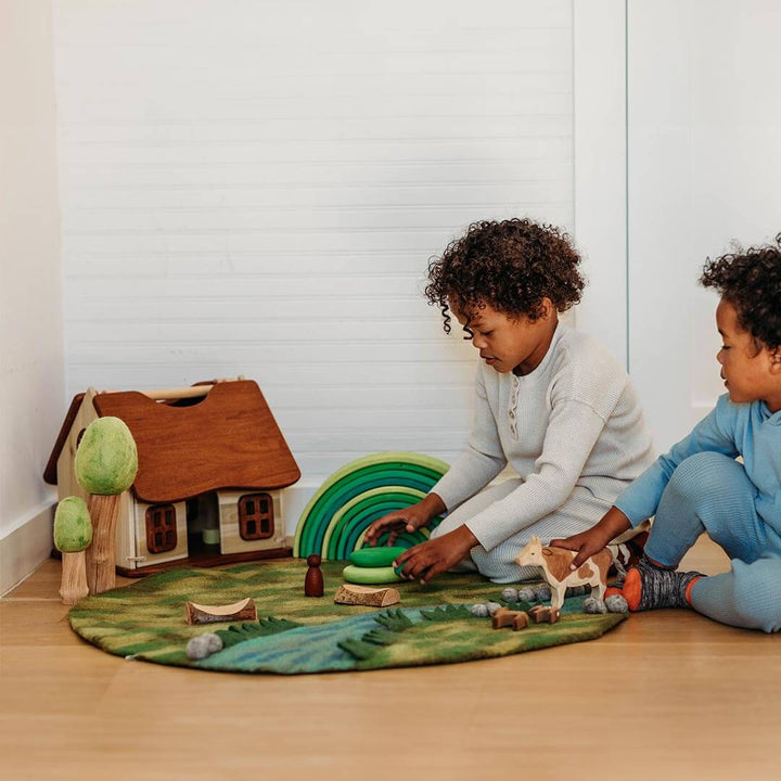 Kids playing with Felted Spring Play Mat Playscape