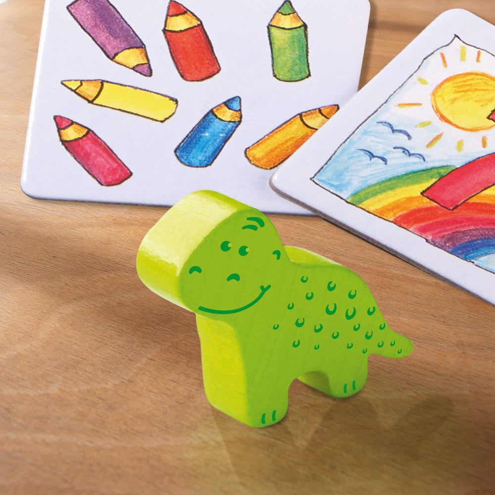 Wooden green dinosaur game piece