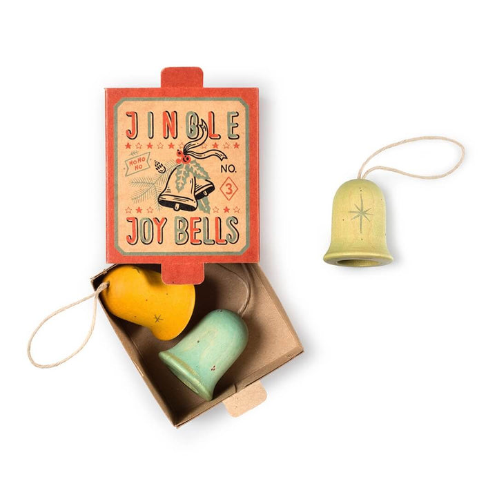 Grapat Jingle Joy Bells wooden ornaments in a cardboard box.