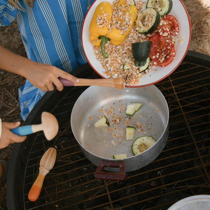 Grapat Tools Collection with woman cooking