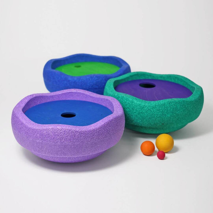 3 cool colored discs set inside of foam stepping stone from Stapelstein.