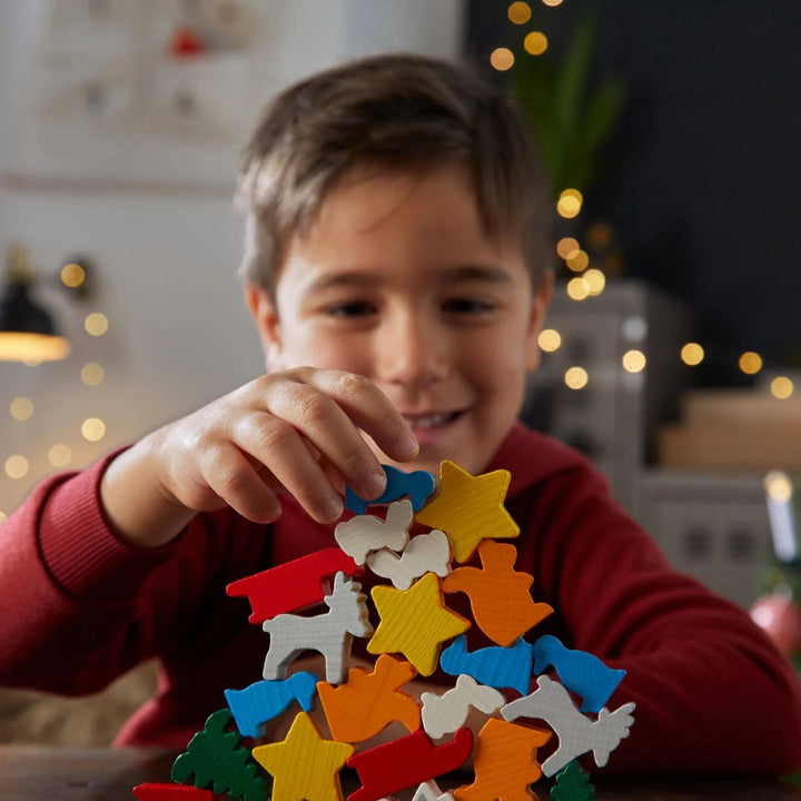 HABA Animal Upon Animal- A Christmas Stacking Game-Child playing with wooden figures- Bella Luna Toys