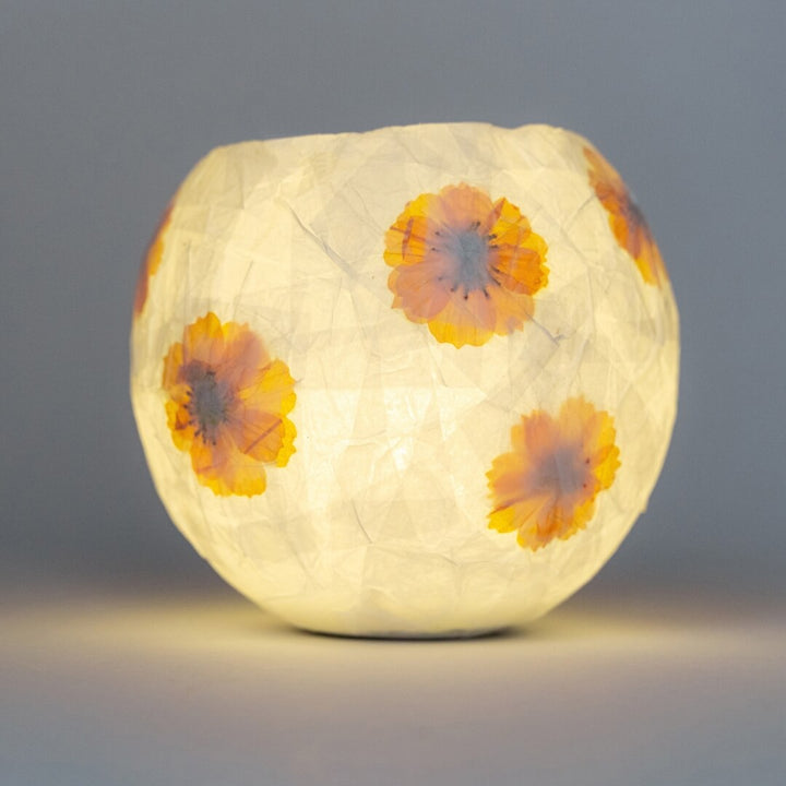 Finished Flower Paper Lantern glowing from within.