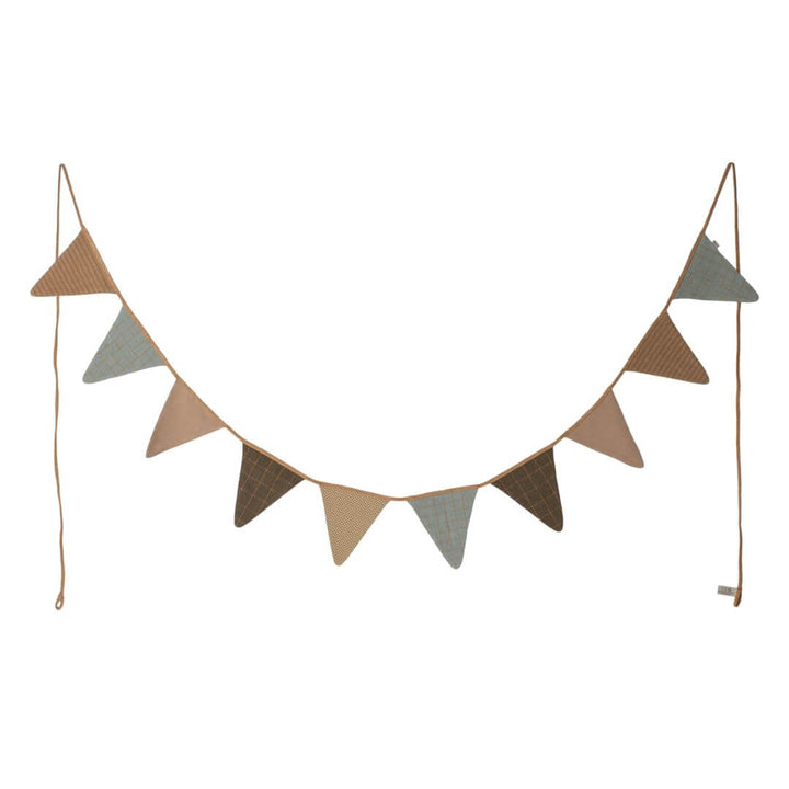 Maileg Ocher Flag Garland – a nearly 10-foot-long fabric garland featuring 11 triangular flags in earthy ocher and muted tones. Perfect for nursery or festive decor shown strung up to see all the 11 flags against a white back drop.