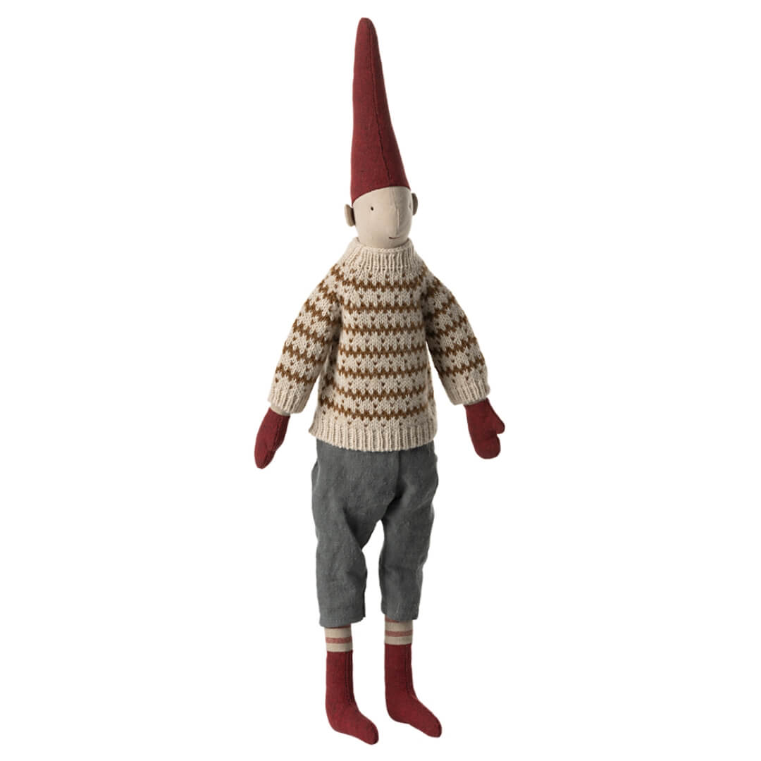 Maileg medium Pixy Boy - standing up and wearing a stripped knit sweater, grey linen pants and red mittens, socks and pixy cap.