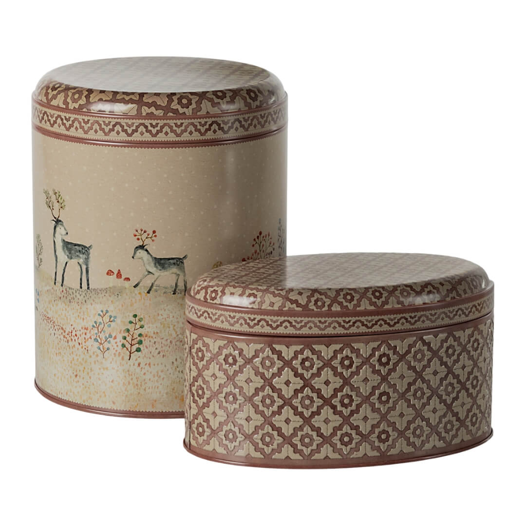 Set of 2 metal storage tins with a Scandanavian inspired illustration of reindeer.