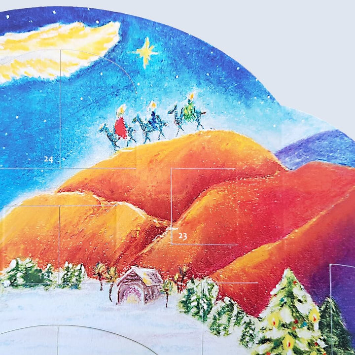 Close details on the Waldorf Lights of Advent calendar depicting holiday scenes.