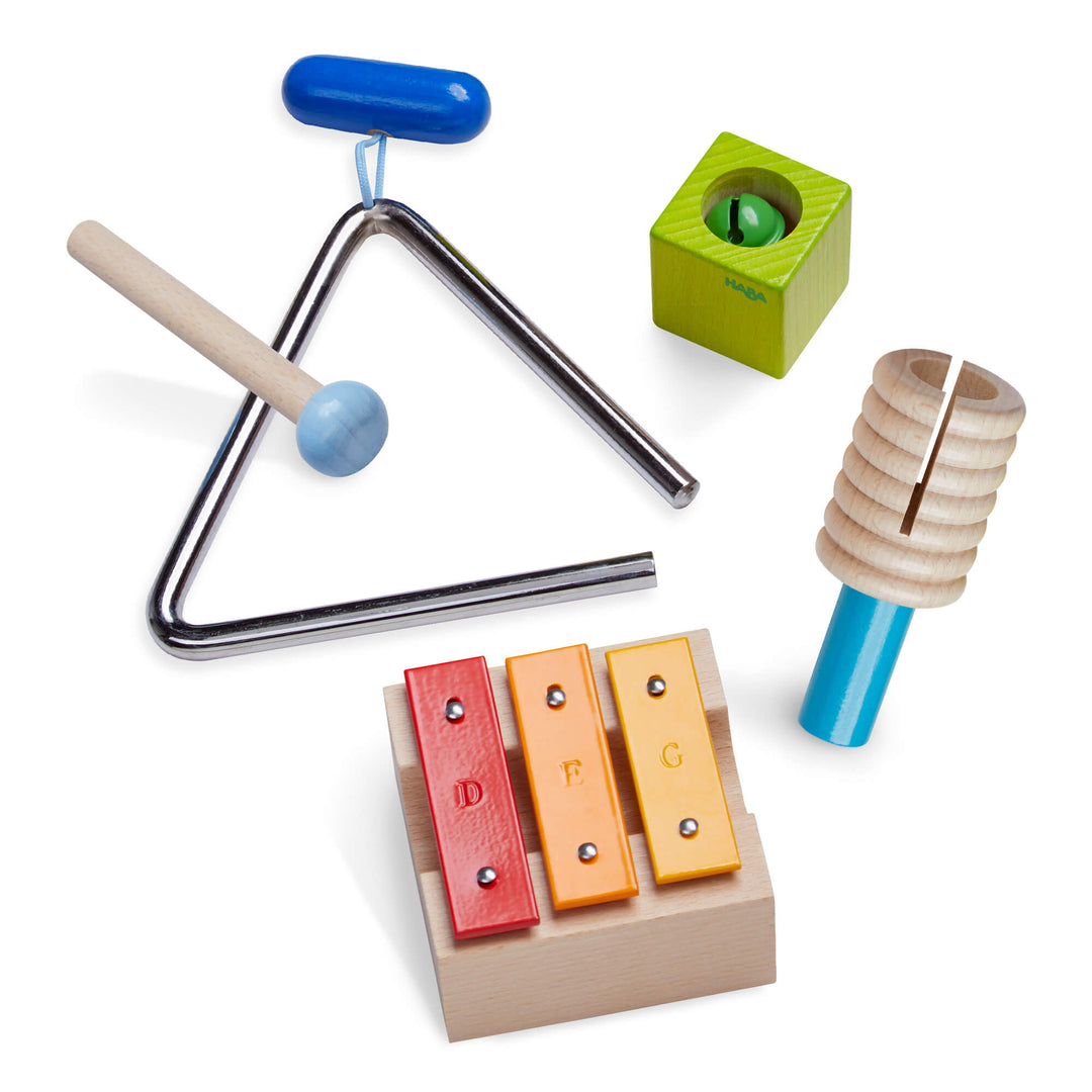 Musical Sounds Musical Joy with metal triangle and mallet, green jingle wooden block with bell, Metallophone tuned to D, E, and G, and wooden rattle with blue handle