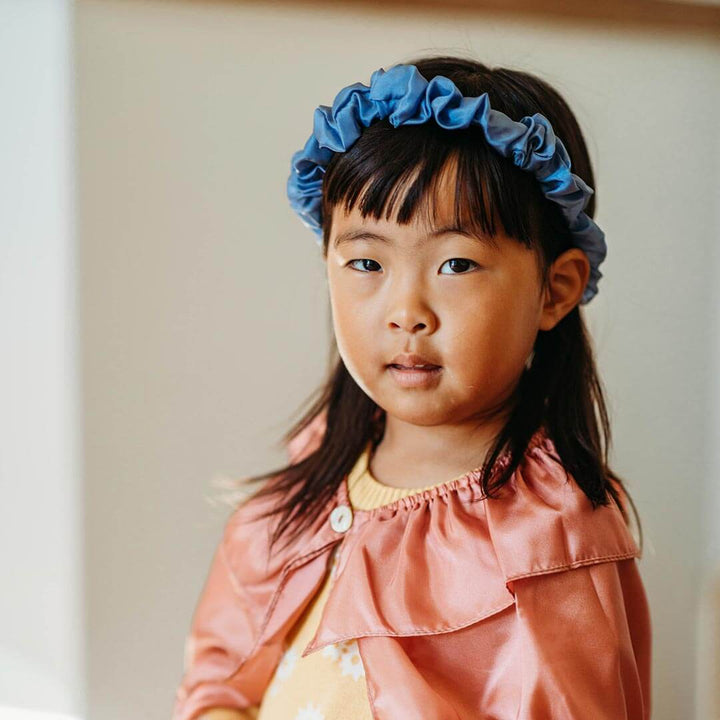 Child wearing Sarah's Silks Northern Coast Playsilk Garland Crown in Tidewater