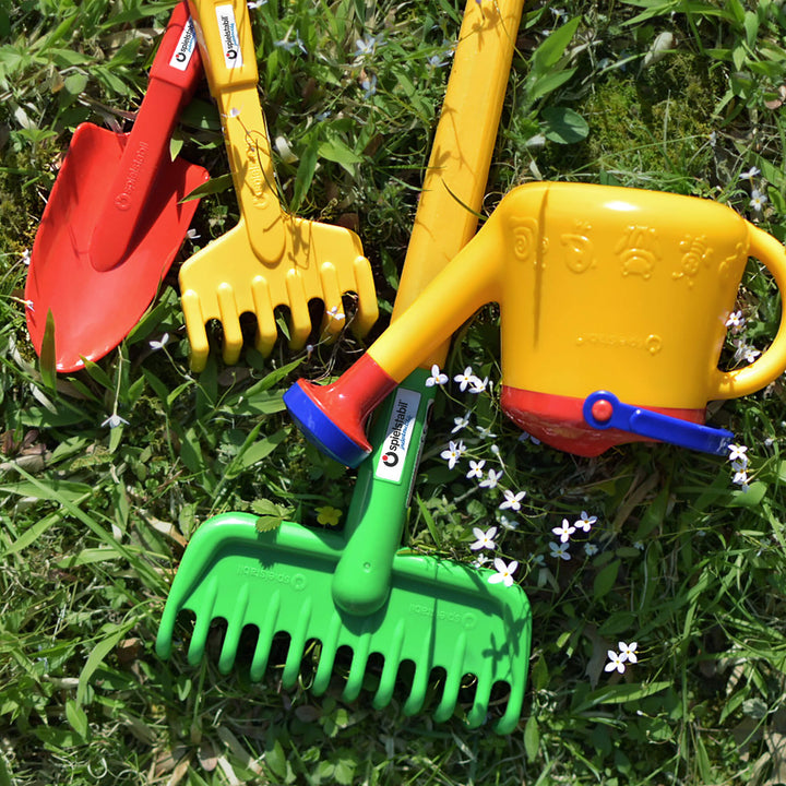 My First Gardening Tool bundle laying in the grass