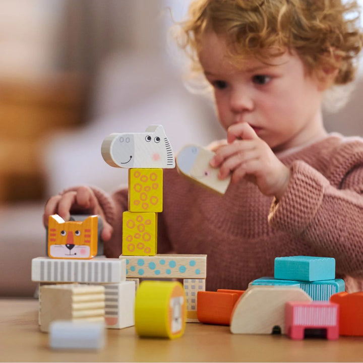 HABA Animal Parade Blocks- Board games and wooden toys- Oompa ToysHABA Animal Parade Blocks- Board games and wooden toys- Child playing with wooden blocks, creating different types of animals-HABA Animal Parade Blocks- Board games and wooden toys- Bella Luna Toys